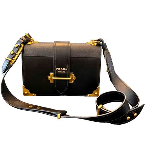 prada cartella|Prada handbags recycling.